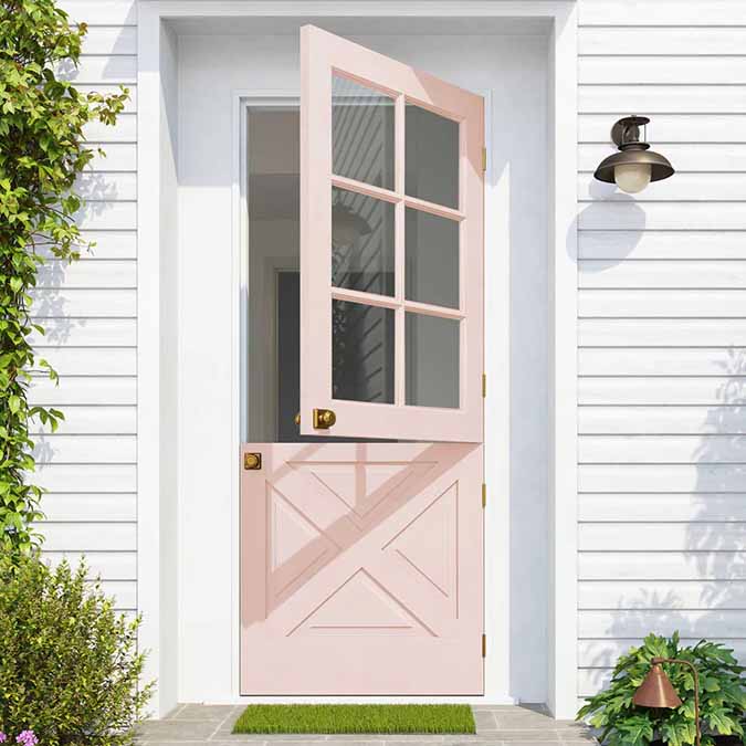 A residential home exterior in the house paint color Baby Soft, the perfect soft baby pink paint color from Clare. Baby Soft is a classic light pink paint color that's soft and sweet. Shop now and get premium, zero VOC paint delivered to your door.