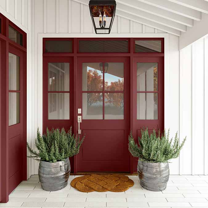 A residential home exterior in the house paint color Vintage, the perfect burgundy paint from Clare. Another glass, please! Consider this bold burgundy paint, the color equivalent of a heavy pour from your favorite bottle of red—rich, enveloping and a total treat for the senses.