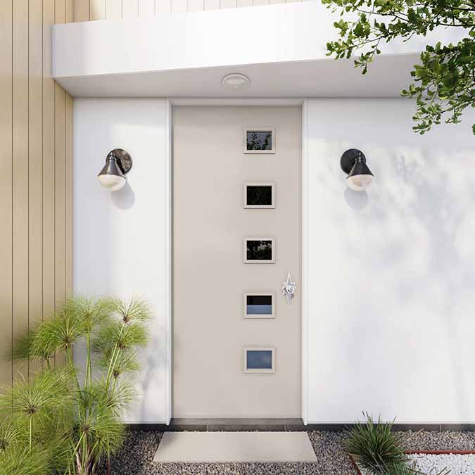 A residential home exterior in the house paint color Beigeing, the perfect classic beige paint color from Clare. Beigeing is a warm, modern beige paint color with a sophisticated and welcoming vibe. Shop now and get premium, zero VOC paint delivered to your door.