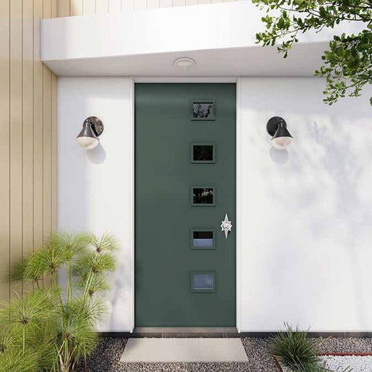 A residential home exterior in the house paint color Current Mood, the perfect green interior paint color from Clare. Current Mood is a deep, moody green paint color for those who aren't afraid to bring the drama. This bold, dark green is both intense and alluring. Shop now.