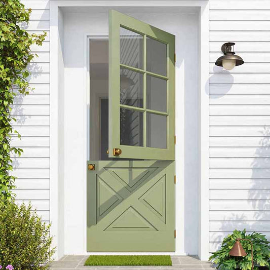 A residential home exterior in the house paint color Extra Virgin, the perfect moss green paint color from Clare. The green that goes with everything. Like the good stuff you drizzle to elevate a dish, it’s the essential ingredient that pulls a room together.