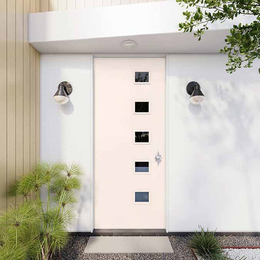 A residential home exterior in the house paint color Wing It, the perfect best light pink paint color from Clare. Wing It is a sophisticated pale pink paint color and a best-seller that's versatile enough to feel like a neutral. Shop now.