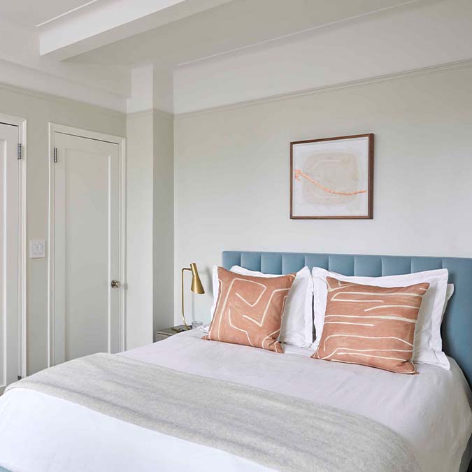 A beautiful home interior room painted in Classic, the perfect dove gray beige paint color from Clare. Classic is a soft, timeless greige paint color that brings a clean, modern feel to any space.  Shop now.