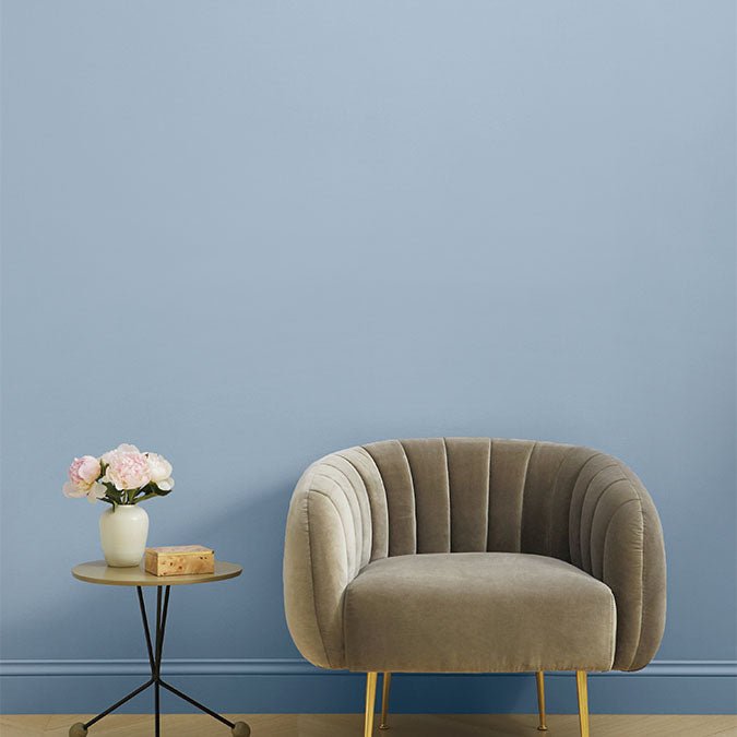 A beautiful home interior room painted in Cloud Watching, the perfect peaceful blue from Clare. Cloud Watching is a peaceful blue paint color. Like looking up at a perfect sky on a balmy summer day, it’s guaranteed to lift your space higher. Shop now.