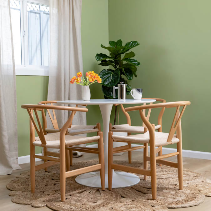 A beautiful home interior room painted in Extra Virgin, the perfect moss green paint color from Clare. The green that goes with everything. Like the good stuff you drizzle to elevate a dish, it’s the essential ingredient that pulls a room together.