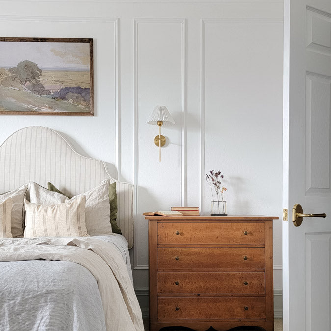 A beautiful home interior room painted in Fresh Kicks, the perfect bright white paint color from Clare. Fresh Kicks is a clean, bright white paint color with no undertones. Fresh and modern, like your favorite white pair, straight out the box. Shop now.