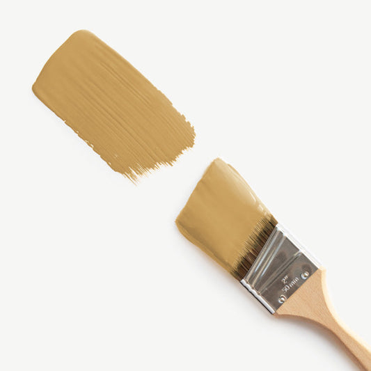 A beautiful home interior room painted in Good as Gold, the perfect golden yellow paint shade from Clare. Good as Gold is stunning golden yellow paint shade! Cheerful yet perfectly subdued, this mellow mustard hue is worth its weight in gold!