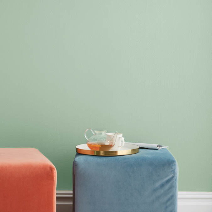 A beautiful home interior room painted in Two Scoops, the perfect mint green paint color from Clare. Two Scoops is a fresh, mint green paint color This cool hue is so irresistible, one scoop just wouldn't cut it.  Shop now.