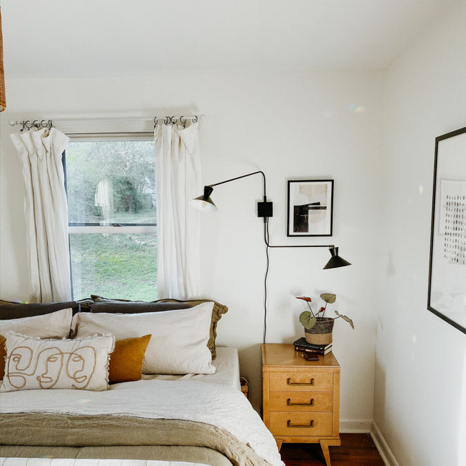 A beautiful home interior room painted in Whipped, the perfect warm white paint color from Clare. Whipped is the perfect warm white paint color Dreamy and whisked-to-perfection, this is the warmest of our whites and a constant best-seller! Shop now.