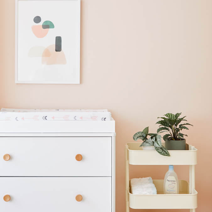 A beautiful home interior room painted in Wing It, the perfect best light pink paint color from Clare. Wing It is a sophisticated pale pink paint color and a best-seller that's versatile enough to feel like a neutral. Shop now.